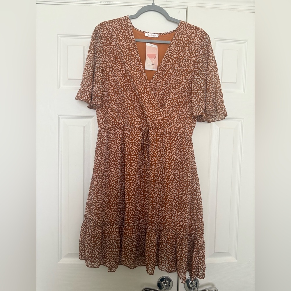 Short burnt orange wrap dress. Size large.